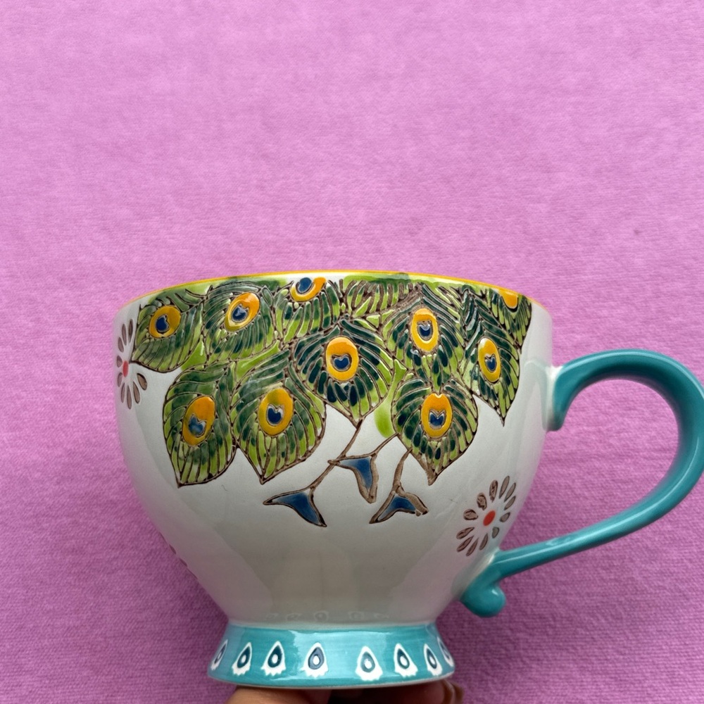 Dutch wax mug peacock feather motif